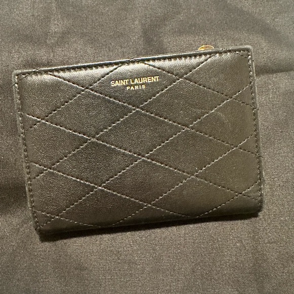Saint Laurent Bi-fold wallet - Picture 1 of 4